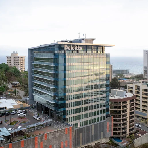 Drone photo showing Deloitte Haus in foreground of Nambawan Super Plaza