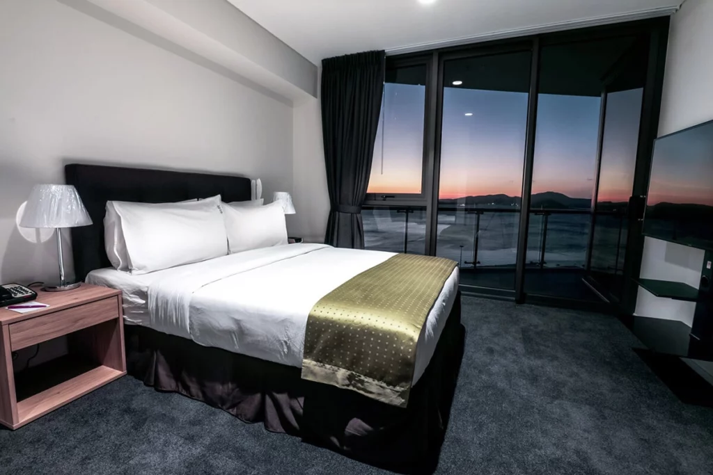 Bedroom with sunset view at Crowne Plaza Residences